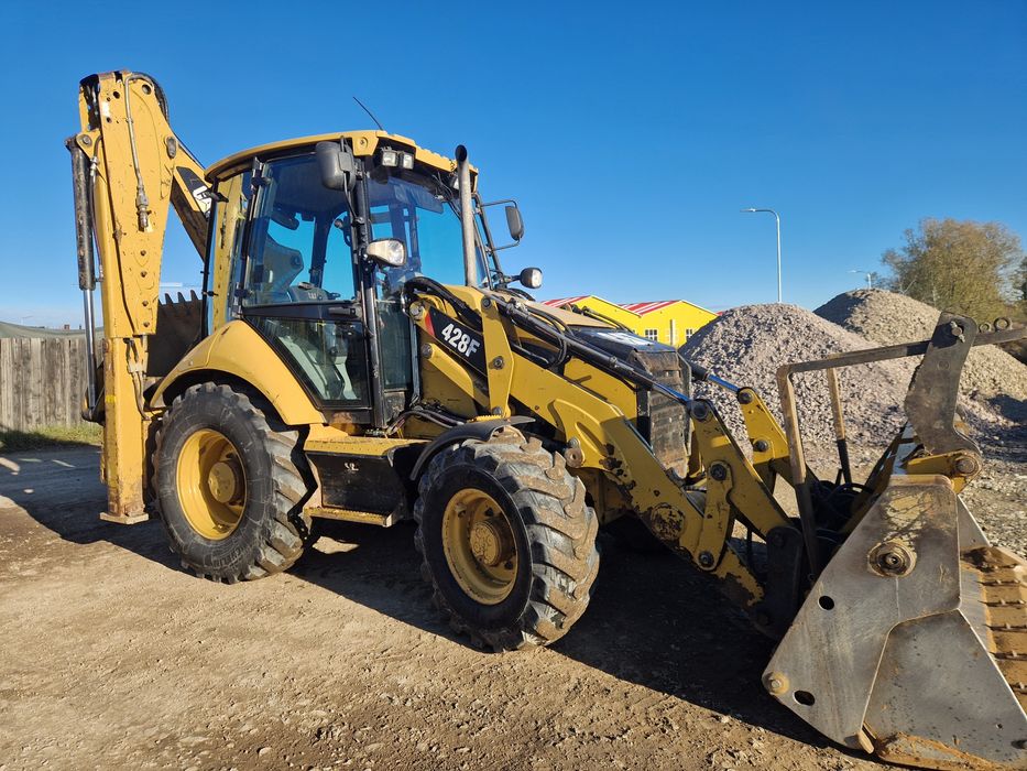 Vand buldoexcavator  cat caterpillar 428F fara ad blue