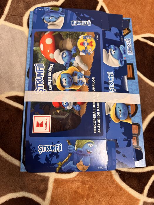 Catalog / cutie Strumfi Kaufland + 2 jocuri/ Schimb cu colectia de 20