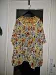 Bluză florală tip poncho cu detalii handmade