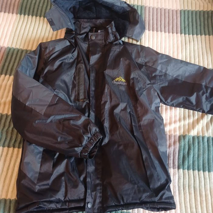 НовыйМужской куртка размер 42-44