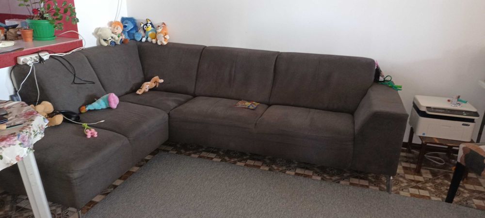 Vând colțar gri  living in stare bună