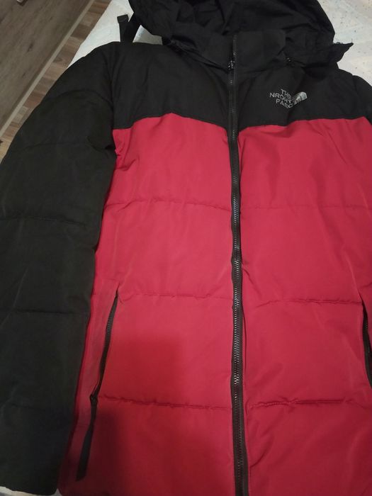 Продам пуховик 48 размер в отличном состоянии