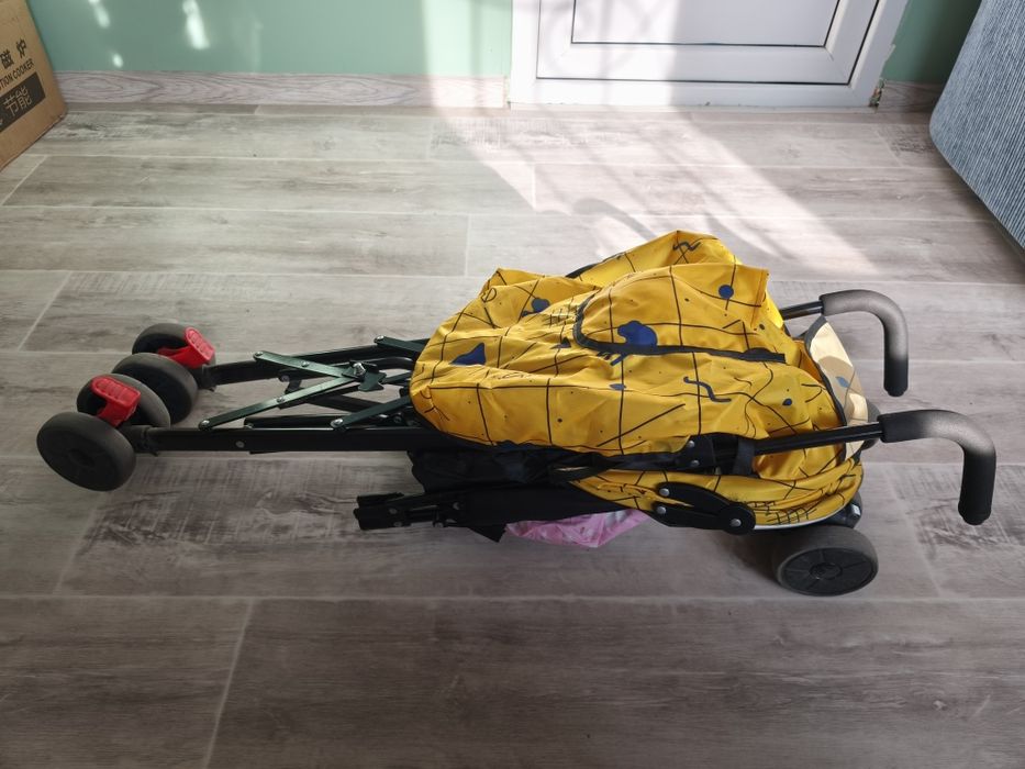 Прогулочная коляска трость