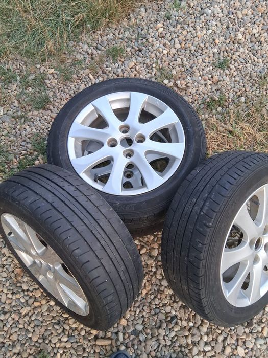 Vând jenti cu cauciucuri  4/100 distanta prizoane 185,  55 R15 dunlop