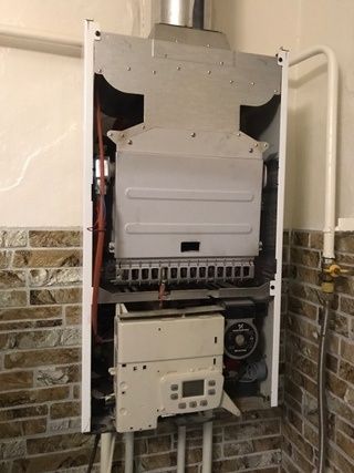 Установка ремонт чистка настенных напольных котлов газ колонок  и т.д