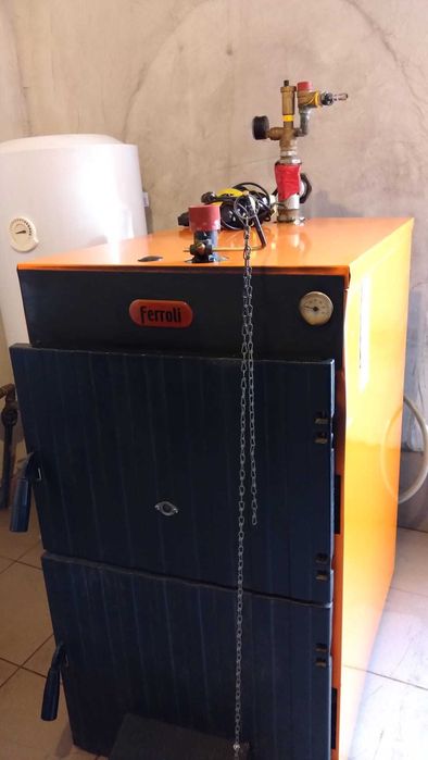 Vând centrală termică pe lemne si carbune Ferroli