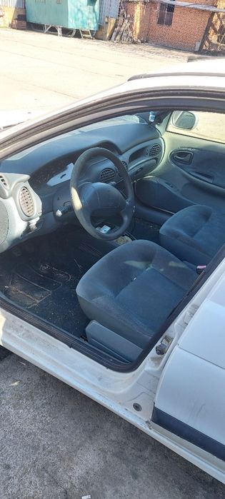 Рено    .  Меган