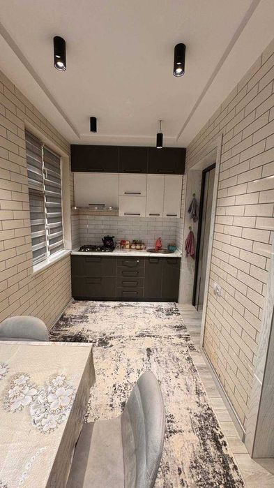 Юнусабад 4 кв 2/1/4 Кирпич 77-серия