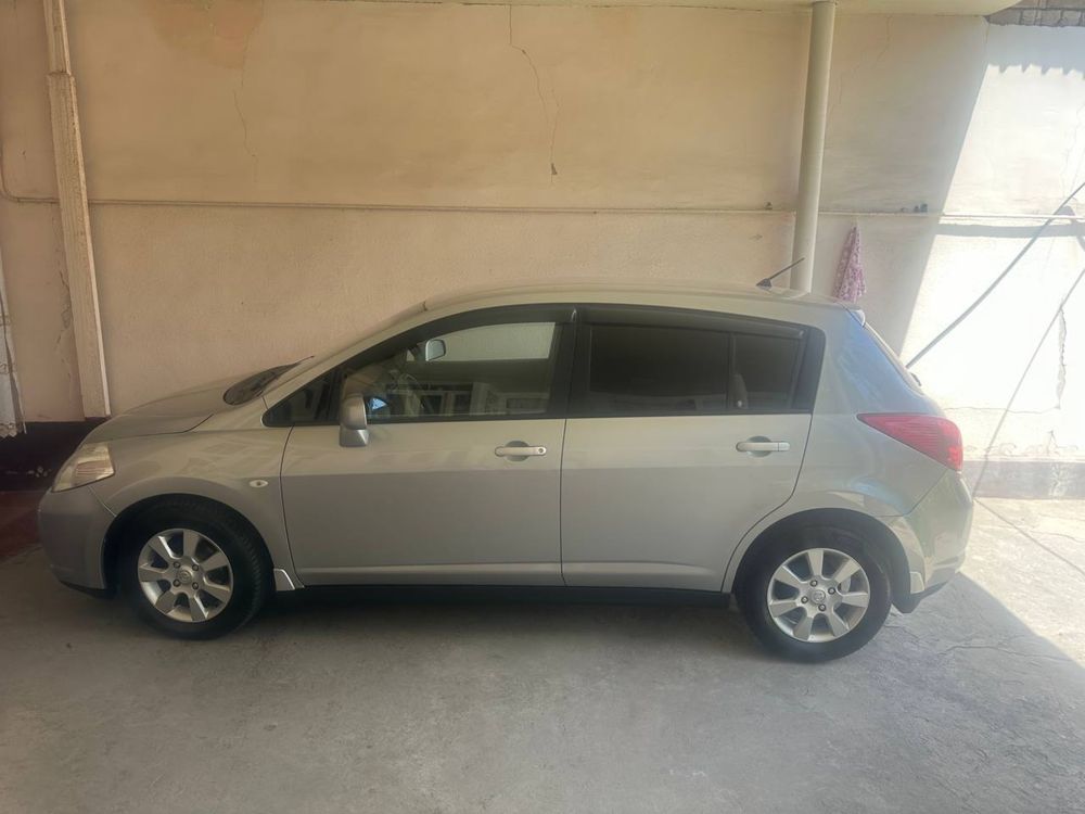 Nissan   Tiida 1,6