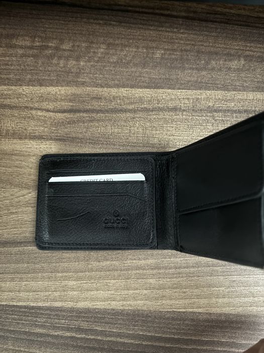 Полтфейл Gucci.