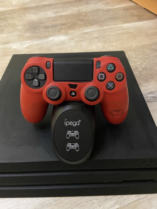 Playstation 4 pro, волан ,игри ,зарядна станция:една игра-25лв!!!