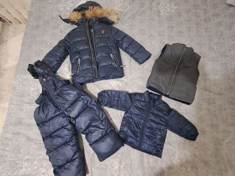 продам зимний комбинезон на мальчика