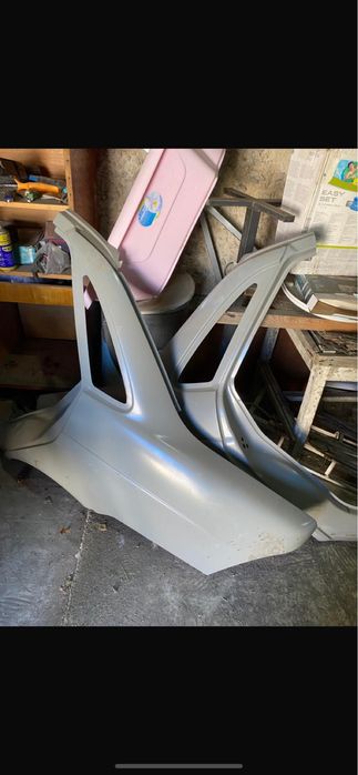 Заднии крылья на Lada Priora