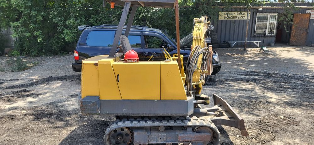 Мини зксковатор кубота япония