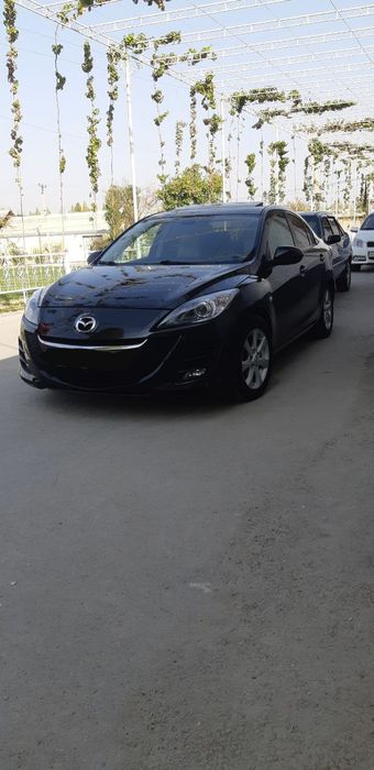 Автомобиль Мазда 3 рейсталинг 2009 йил.