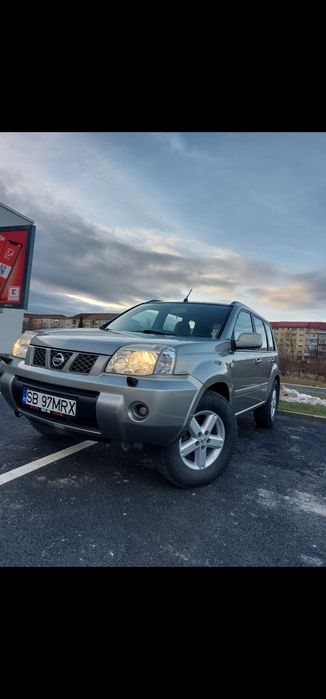 Nissan x trail 2006        ( schimb cu basculabila sau escavator )