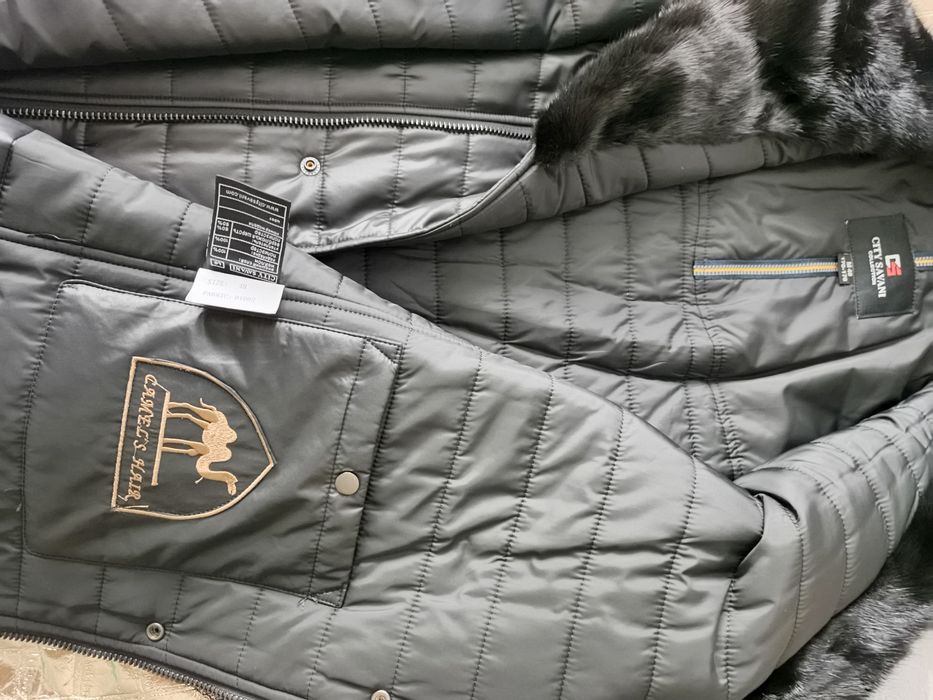 Продам новую куртку зимнюю и шапку