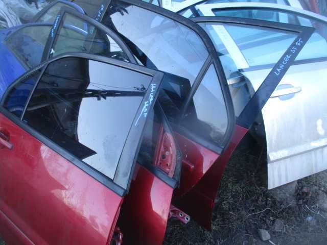 Portiera usa stanga dreapta fata spate MITSUBISHI LANCER an 2006