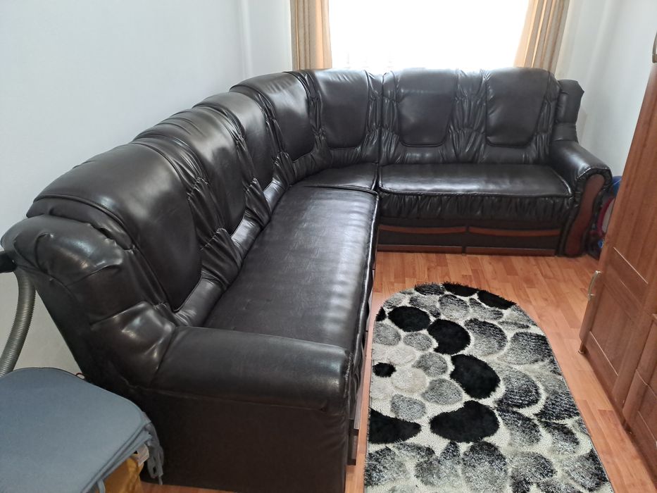 Coltar extensibil de piele