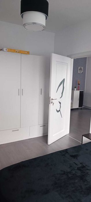 Inchiriez ap 2 camere mobilat/utilat complet,curte proprie-Sanpetru