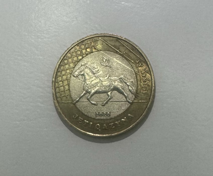 Монета 100 тенге в сакском стиле