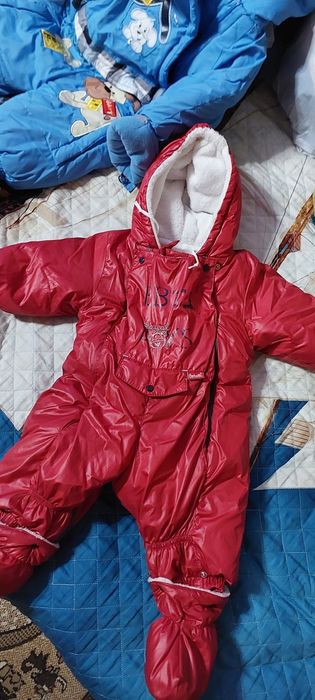 Продам детские комбинезоны