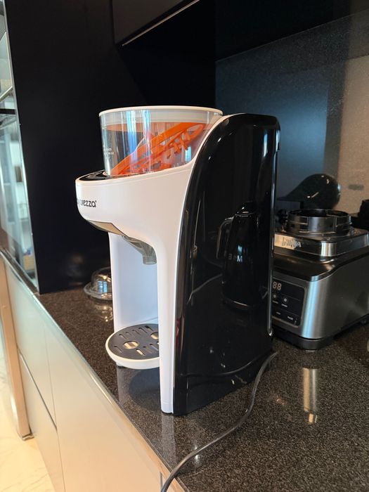 Babybrezza уред за мляко