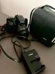 фотоапарат Canon EOS 4000D + обектив Canon +чанта и включено зарядно