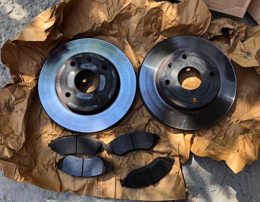 Продам опорные диски и колодки на Lacetti