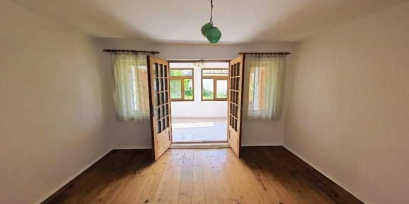 Proprietate 1780m2 cu 2 case/livada/garaj