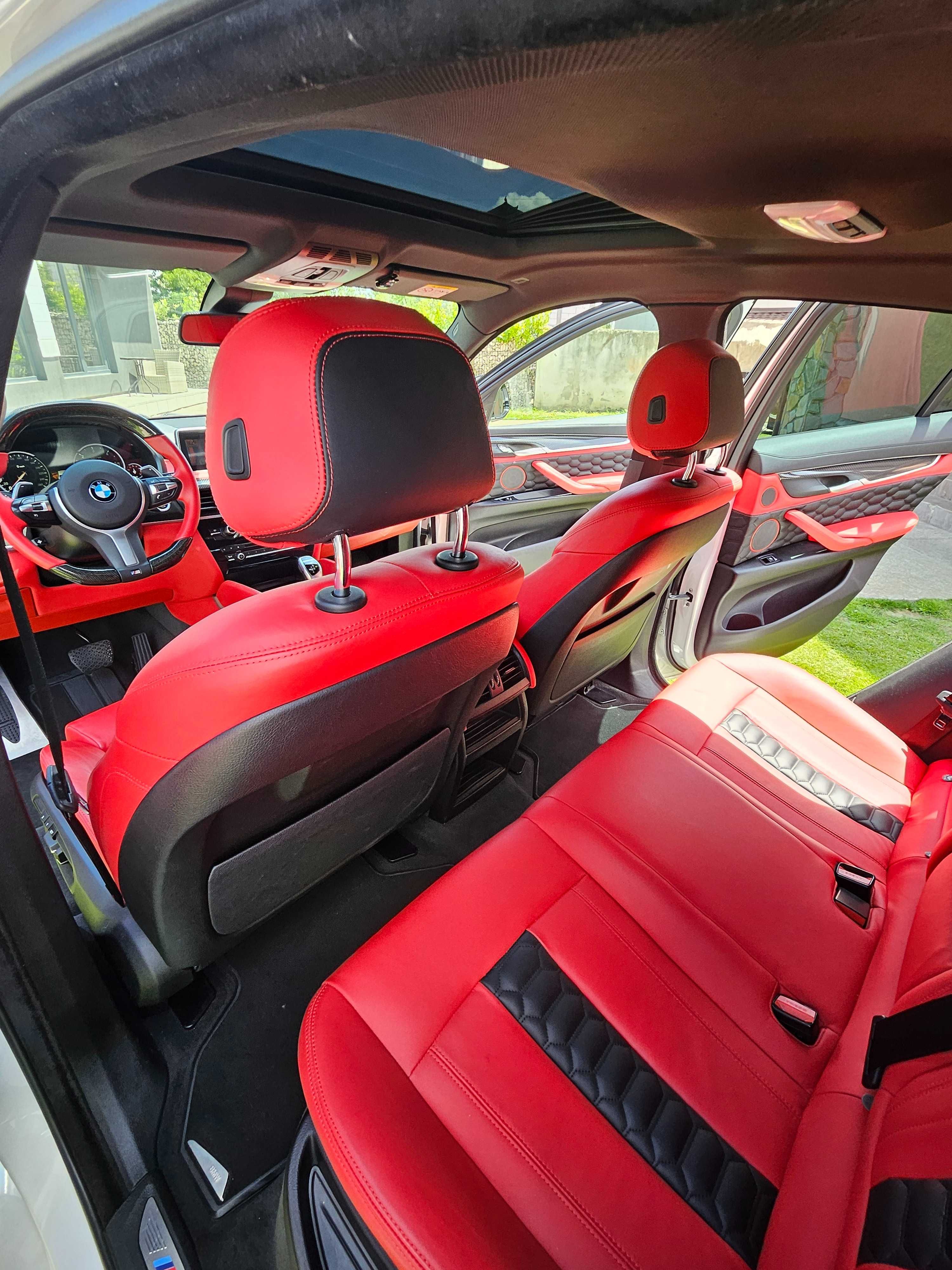 Un BMW X6 deosebit.   3.0 Diesel xDrive de 258 CP, Alb cu piele rosie