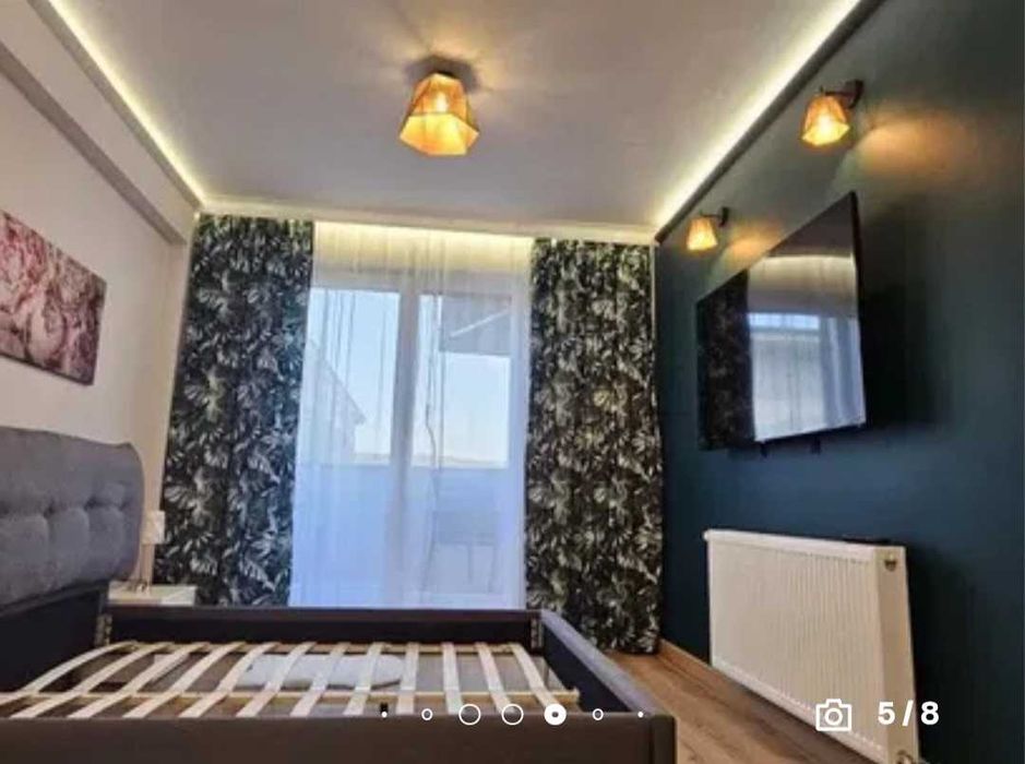 Apartament 2 camere,ultrafinisat,mobilat,utilat la cheie,terasa 12mp.