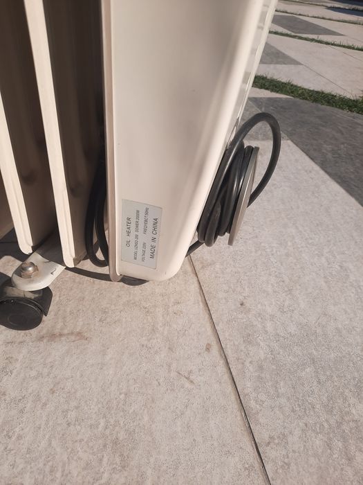 Маслянный обогреватель.