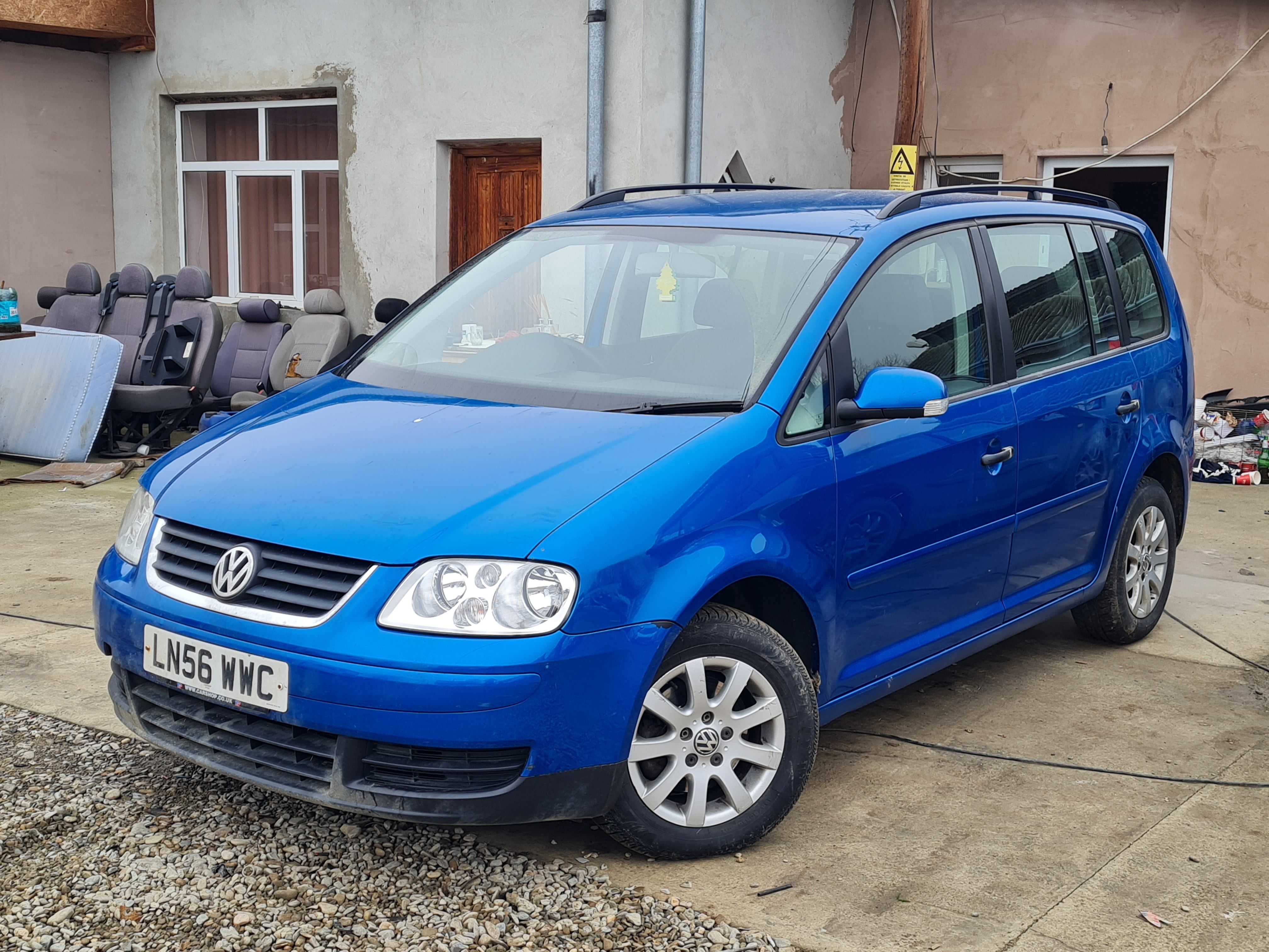 Usa Fata Dreapta volkswagen Touran 2006 Hatchback Albastru