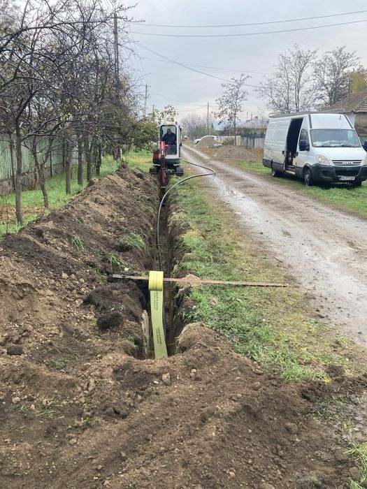 Miniexcavator de inchiriat sapaturi fundatii, beci santuri apa curent