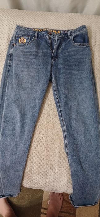 Джинсы новые цена