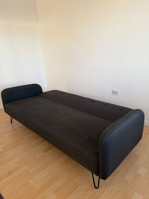 Canapea neagră extensibila