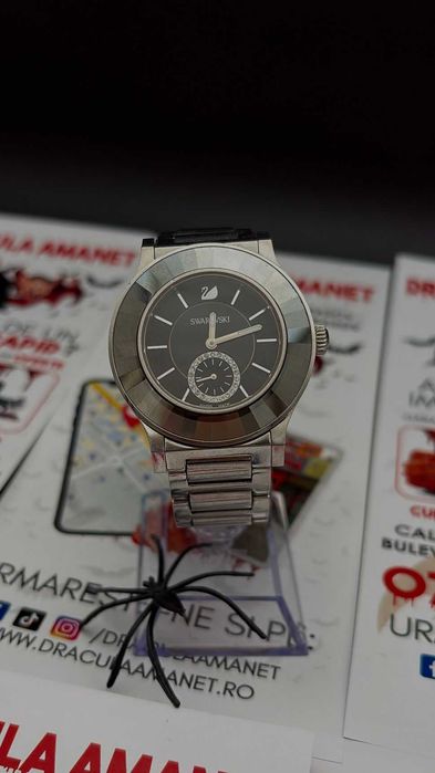 Dracula Amanet; Ceas swarovski.