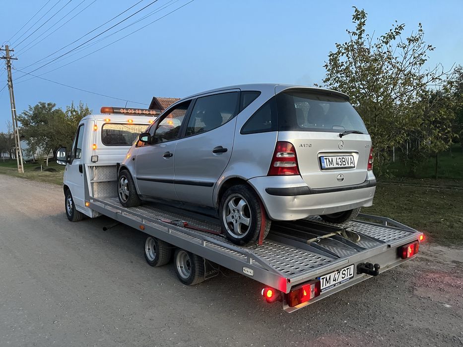 Tractari auto utilaje transport masini platforma slep