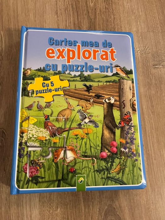 Carte interactivă cu puzzle-uri