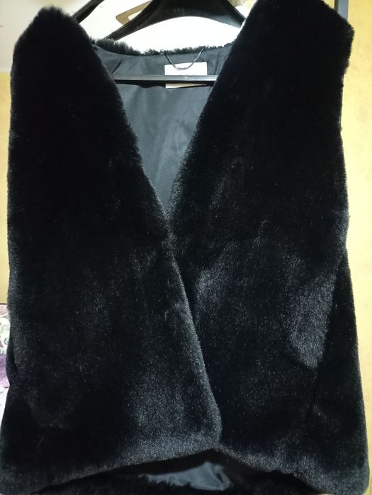 Vesta blana neagra