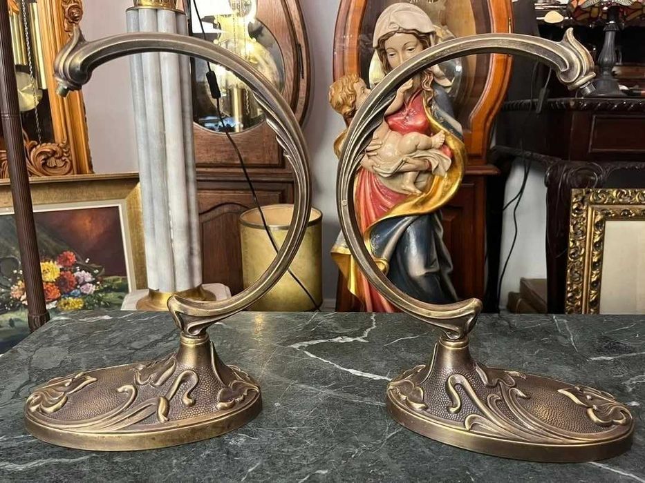 2 suporți din bronz pentru un proiect