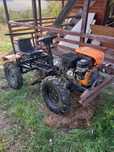 Motocultor modificat cu 4 roti și volan
