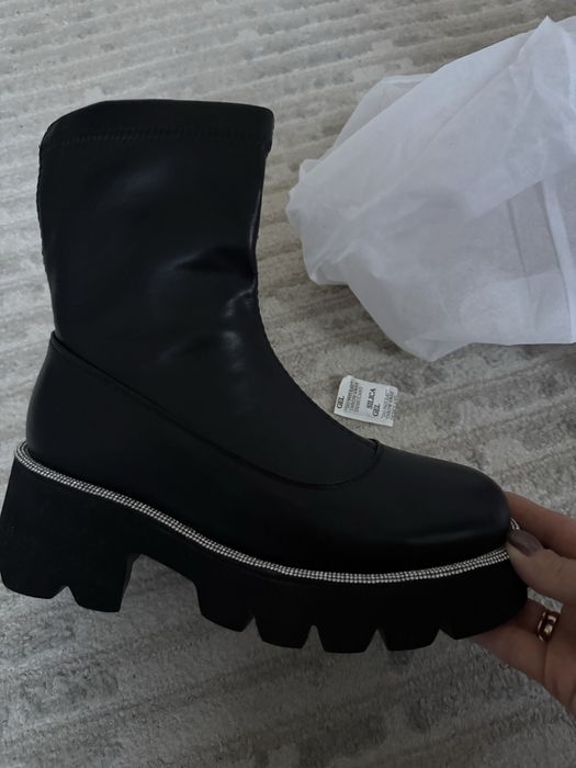 Продам новые сапоги