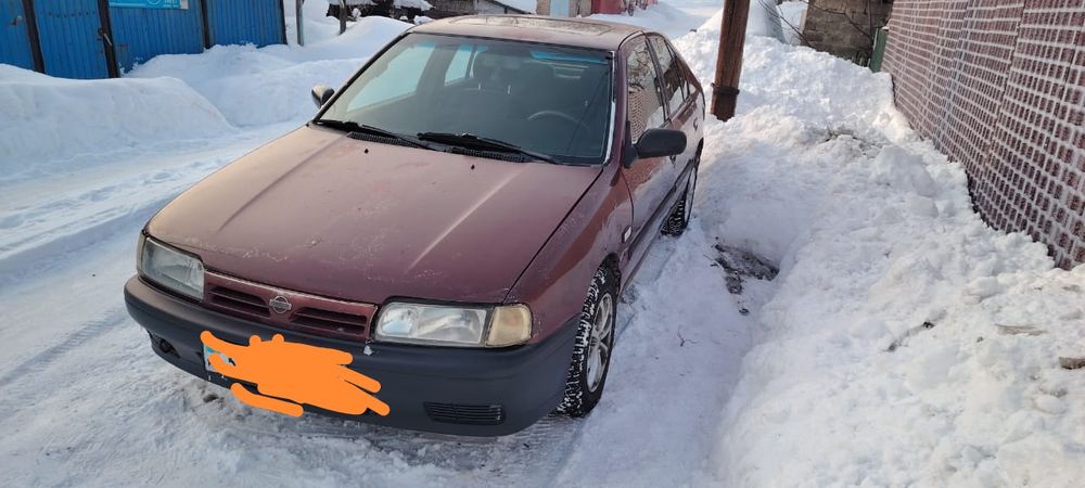 Продам машину ниссан примера 1993г.