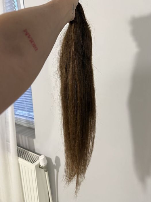 Коса естествена номер шест, много малко носена.