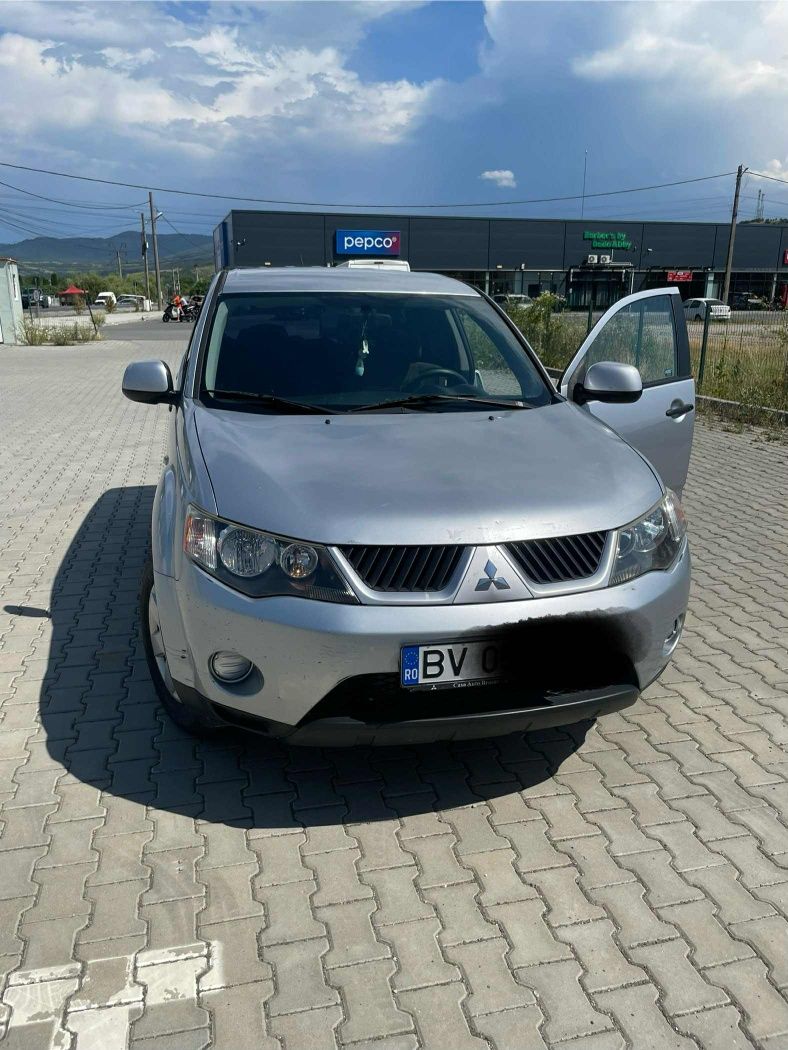 Mitsubishi outlander vand sau schimb