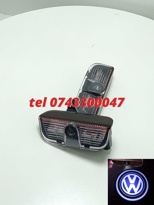 Set 2 Proiectoare Cu Logo Dedicate Vw Passat Golf Touareg Sharan