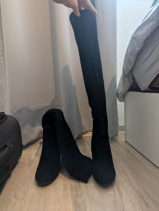 Високи ботуши на ток