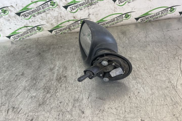 Oglinda stanga manuala E20103017 / E2 0103017 Dacia Logan prima gener
